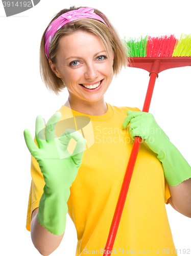 Image of Young woman as a cleaning maid