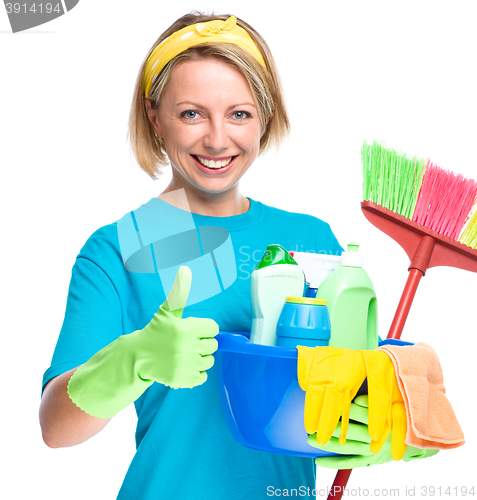 Image of Young woman as a cleaning maid