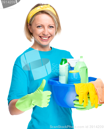 Image of Young woman as a cleaning maid