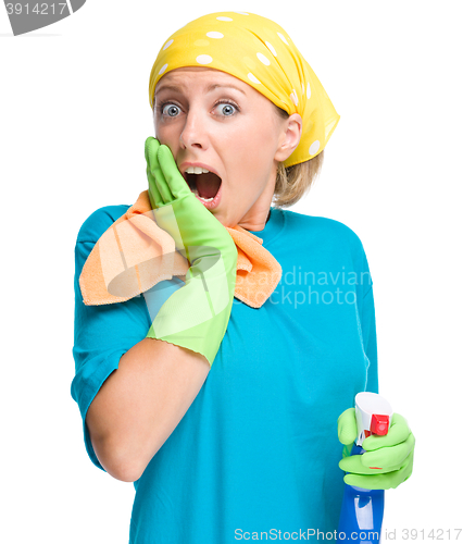 Image of Young woman as a cleaning maid