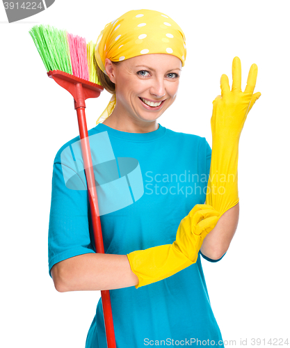 Image of Young woman as a cleaning maid