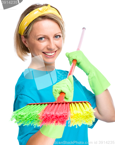 Image of Young woman as a cleaning maid