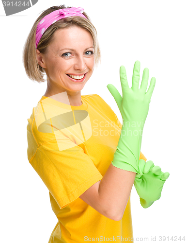 Image of Young woman as a cleaning maid