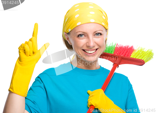 Image of Young woman as a cleaning maid