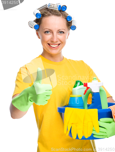 Image of Young woman as a cleaning maid