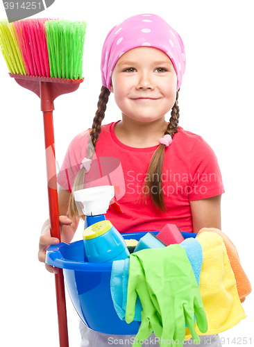 Image of Young girl is dressed as a cleaning maid