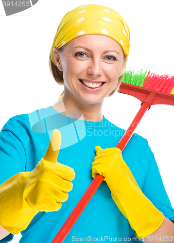 Image of Young woman as a cleaning maid