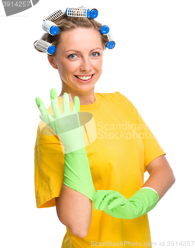 Image of Young woman as a cleaning maid