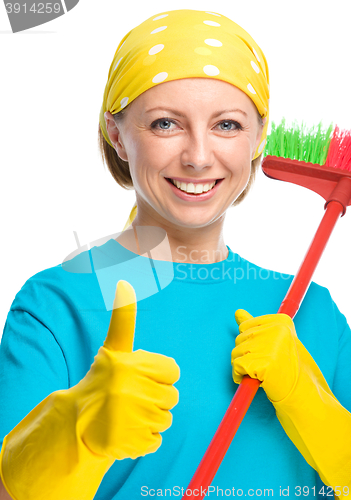 Image of Young woman as a cleaning maid