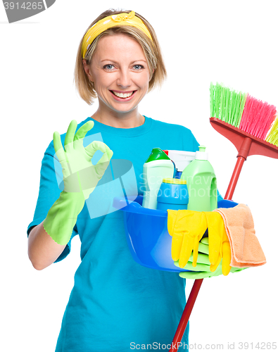 Image of Young woman as a cleaning maid