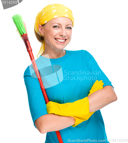 Image of Young woman as a cleaning maid