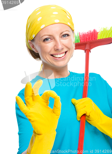 Image of Young woman as a cleaning maid