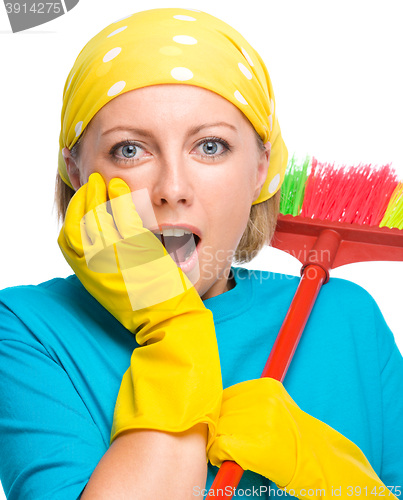 Image of Young woman as a cleaning maid