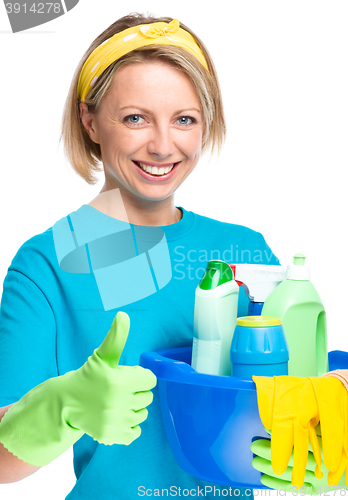 Image of Young woman as a cleaning maid