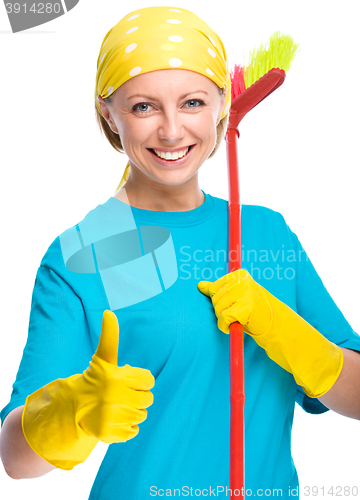 Image of Young woman as a cleaning maid