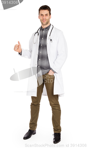 Image of Happy male doctor showing thumb up