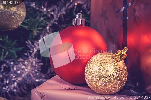 Image of Red and golden Xmas baubles