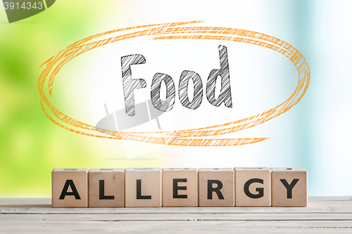 Image of Food allergy sign on a table