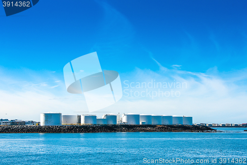 Image of Silo facilities by a blue ocean