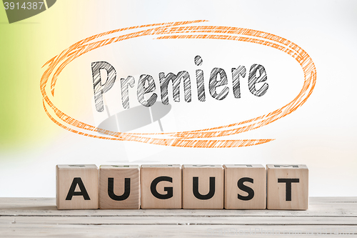 Image of August premiere sign on a scene