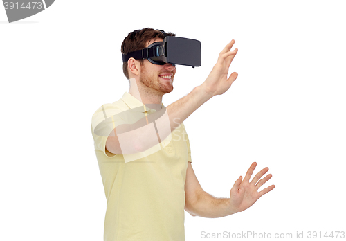 Image of happy man in virtual reality headset or 3d glasses