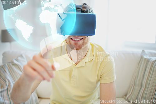 Image of young man in virtual reality headset or 3d glasses