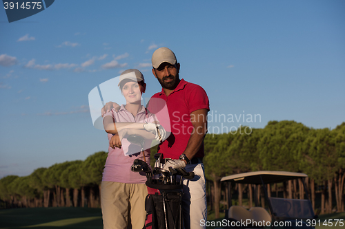 Image of portrait of couple on golf course