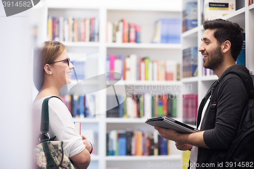 Image of students group  in school  library
