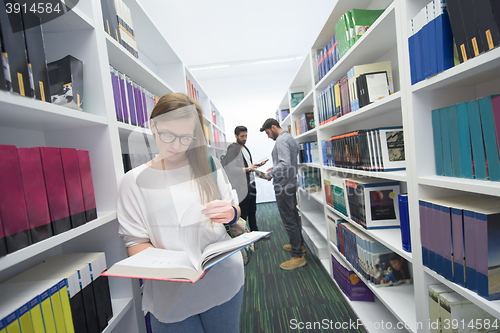 Image of students group  in school  library