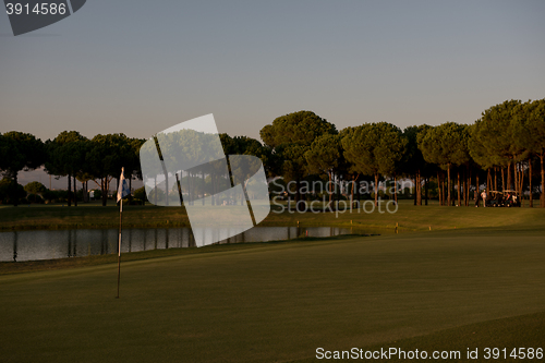 Image of golf course on sunset