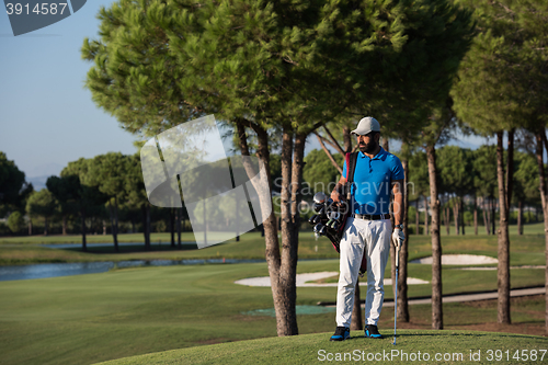 Image of golf player portrait at course