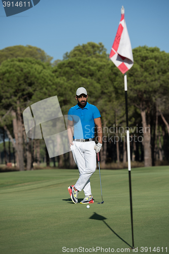 Image of golf player portrait at course