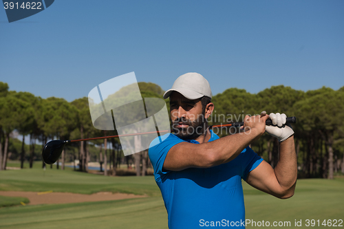 Image of golf player hitting shot