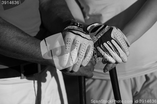 Image of portrait of couple on golf course