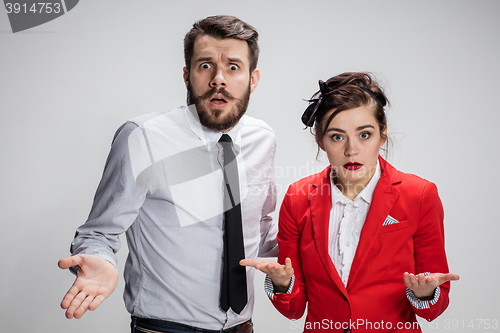 Image of The business man and woman on a gray background