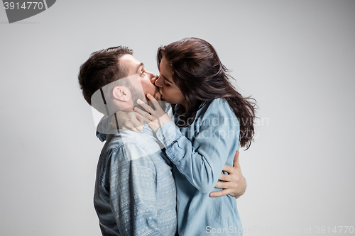 Image of Portrait of happy couple on gray background