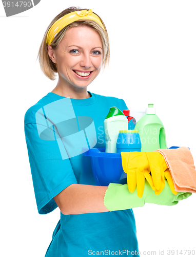 Image of Young woman as a cleaning maid