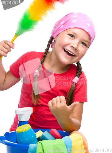 Image of Young girl is dressed as a cleaning maid