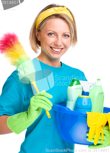 Image of Young woman as a cleaning maid