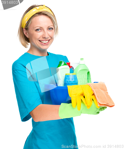 Image of Young woman as a cleaning maid