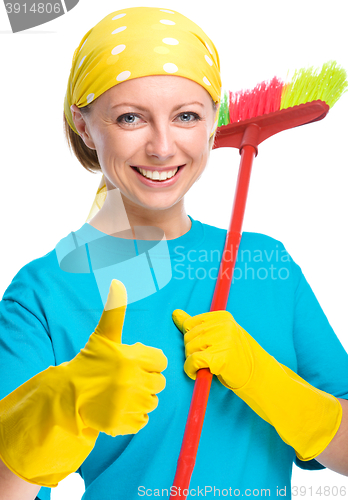 Image of Young woman as a cleaning maid