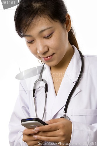 Image of Female Doctor with Mobile Phone