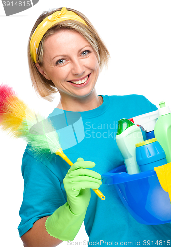 Image of Young woman as a cleaning maid