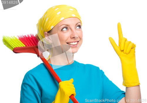 Image of Young woman as a cleaning maid