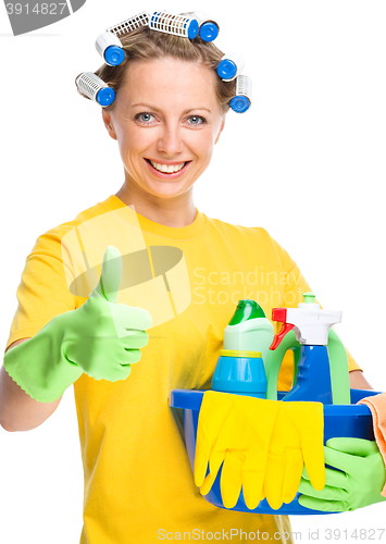 Image of Young woman as a cleaning maid