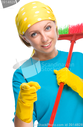 Image of Young woman as a cleaning maid