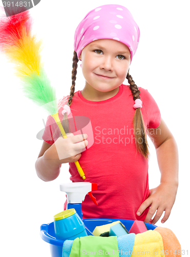 Image of Young girl is dressed as a cleaning maid