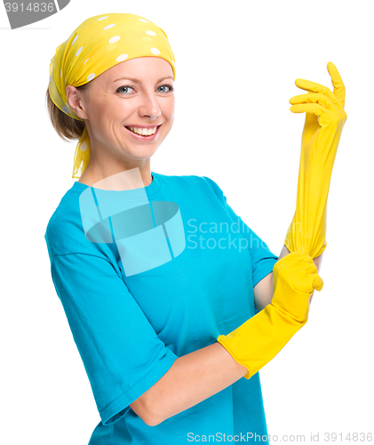 Image of Young woman as a cleaning maid