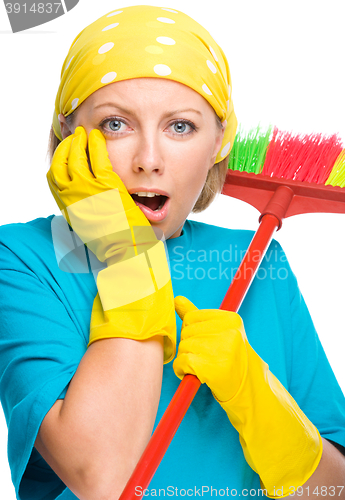 Image of Young woman as a cleaning maid