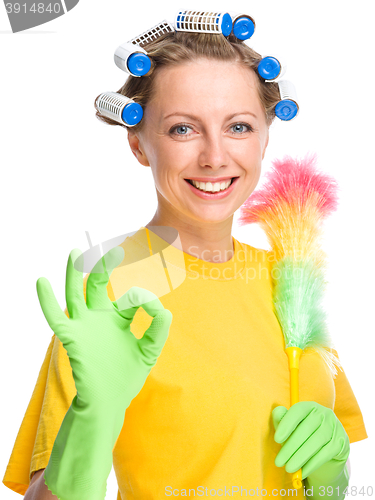 Image of Young woman as a cleaning maid